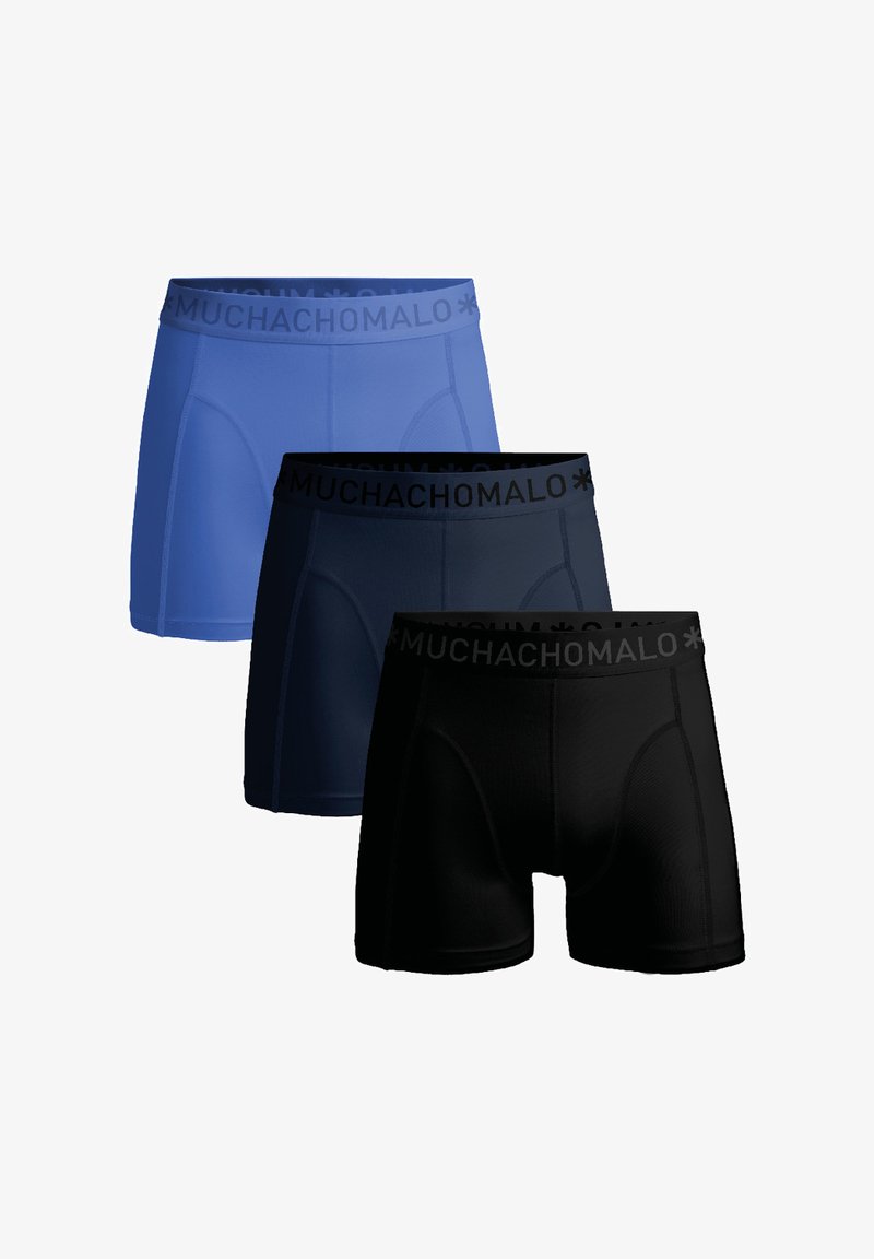 Trīs vīriešu bokseršorti: viens zilā, viens tumši zilā un viens melnā krāsā. Izgatavoti no gludas auduma ar logotipu uz jostas, ar pieguļošu dizainu.