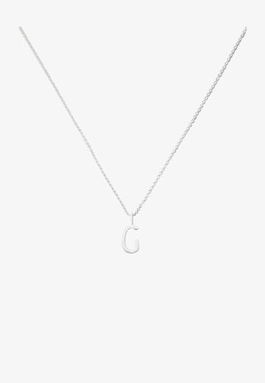 Collier en chaîne en argent avec un pendentif en forme de lettre majuscule 'G', surface lisse, design simple et finition réfléchissante.