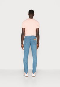 Wrangler TEXAS  - Calças de ganga de perna direita - the story