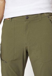Mammut RUNBOLD ZIP OFF PANTS MEN - Calças para exterior - iguana