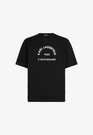Fekete, pamutból készült póló, kerek nyakkivágással, fehér felirattal: "KARL LAGERFELD PARIS 21 RUE ST-GUILLAUME" íves mintában.