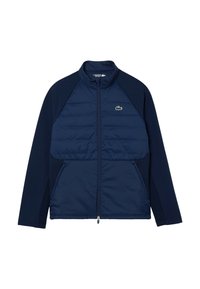 Giacca navy con davanti imbottito, maniche lisce, colletto alto e chiusura a zip completa. Presenta un piccolo logo verde sul lato sinistro del petto.