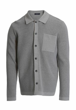 Grijze geribbelde cardigan met een kraag, knoopsluiting aan de voorkant en een borstzak. Heeft een textuurstof en zwarte knopen.