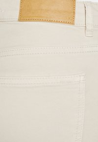 edc by Esprit MEDIUM RISE CROPPED - Calças de ganga de corte skinny - sand