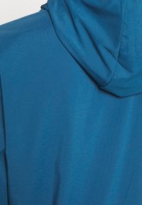 Nike Performance Chaqueta de running - blue