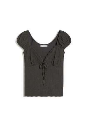 Donkergrijs gestructureerde korte mouwen blouse met opgepofte schouders, V-hals, kanten rand en strikdetail aan de voorkant op een witte achtergrond.