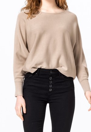 Stickad tröja - beige