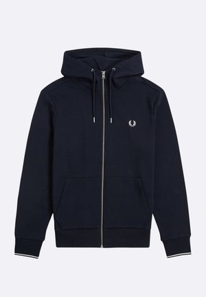 Marineblauwe hoodie met rits, gemaakt van zachte stof, voorzien van een kangoeroezak, verstelbare trekkoorden en een wit geborduurd logo op de borst.