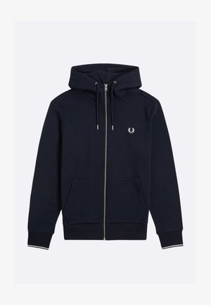 Sudadera con capucha y cremallera en azul marino, hecha de tela suave, con un bolsillo tipo canguro, cordones ajustables y un logo blanco bordado en el pecho.