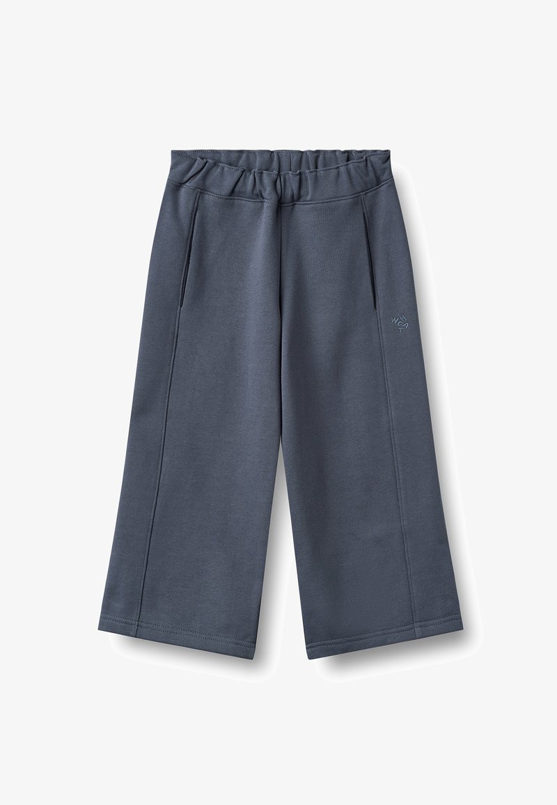 Pantalon large gris foncé avec taille élastique et poches latérales, en tissu doux, présenté sur fond blanc.