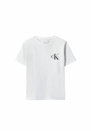 T-shirt bianca a maniche corte con girocollo e piccolo logo nero "cK Calvin Klein" sul petto sinistro.