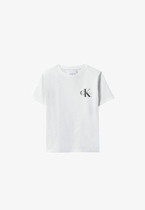 T-shirt blanc à manches courtes et col rond avec petit logo noir « cK Calvin Klein » sur la poitrine gauche.