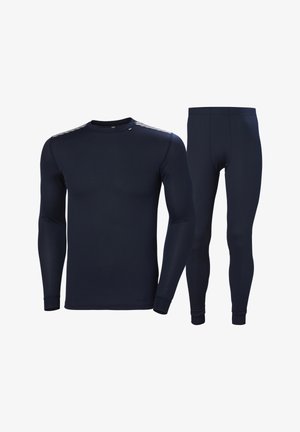 Conjunto para hombre de camiseta térmica azul marino de manga larga y leggings a juego, mostrados sobre fondo blanco.