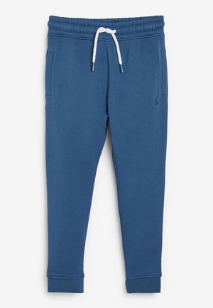 Pantalon de jogging bleu avec taille élastique, cordon blanc, poches latérales, et un petit logo brodé sur la partie supérieure de la cuisse.