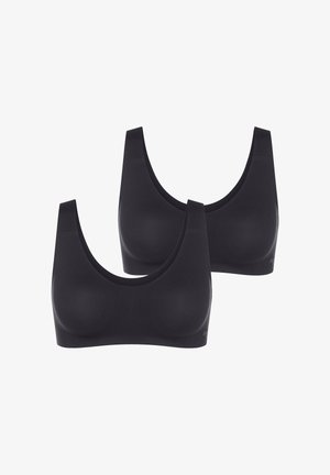 Zwei schwarze nahtlose kabellose BHs mit breiten Trägern, Rundhalsausschnitt und glatter Oberfläche, dargestellt vor weißem Hintergrund.