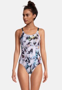 Zwemkleding met geometrisch patroon in pastelkleuren, met brede banden en een hoge beenuitsnijding. Gemaakt van glad, rekbaar stof.