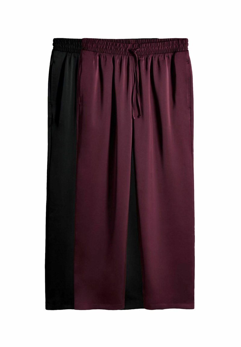 Twee paar wijde broek; één in bordeauxrood en de ander in zwart. Beide hebben een elastische tailleband en een trekkoord. Soepele textuur.