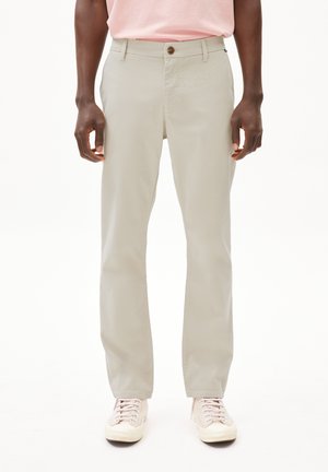 Beige trousers with a straight-leg cut, made of lightweight fabric, featuring a front button closure and side pockets.