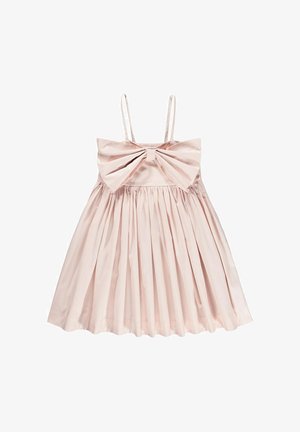 Robe sans manches rose clair avec un grand nœud sur la poitrine, jupe froncée et bretelles fines ajustables. Tissu lisse au toucher doux.