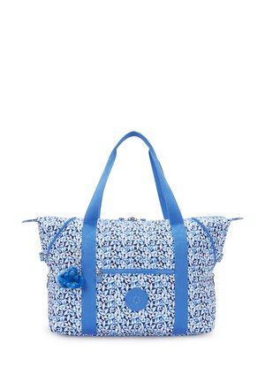 Blue and white patterned tote bag with dual handles, front zipper pocket, and a small blue plush monkey keychain attached.