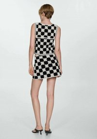 Mango TONINI - Veste sans manches - black