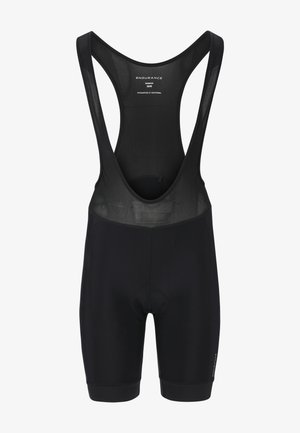 Svarta cykelshorts med meshöverdela, vadderat sittområde och åtsittande design. Har en logotyptryck på sidan och plana sömmar.