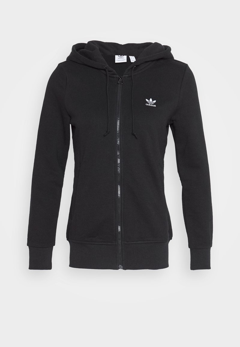 Svart zip-up hoodie i mjuk bomullsblandning, med en dragsko i huvan och en liten vit Adidas-logotyp på vänster bröst.