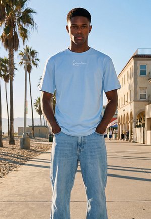 Karl Kani, SMALL SIGNATURE TEE UNISEX - Camiseta estampada - light blue