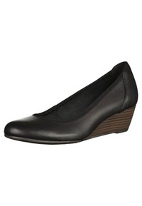 Chaussure compensée en cuir noir avec bout arrondi et talon en bois empilé, vue en angle de côté sur fond blanc.