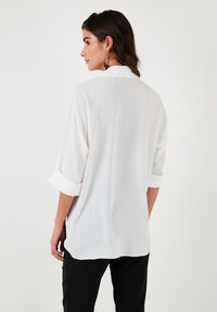 LELA REGULAR FIT - Button-down blouse - white