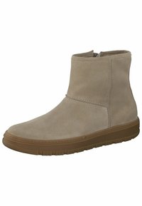 Botas de tobillo de ante beige con un acabado suave, puntera redondeada y suela de goma. Presentan un cierre lateral para facilitar su uso.