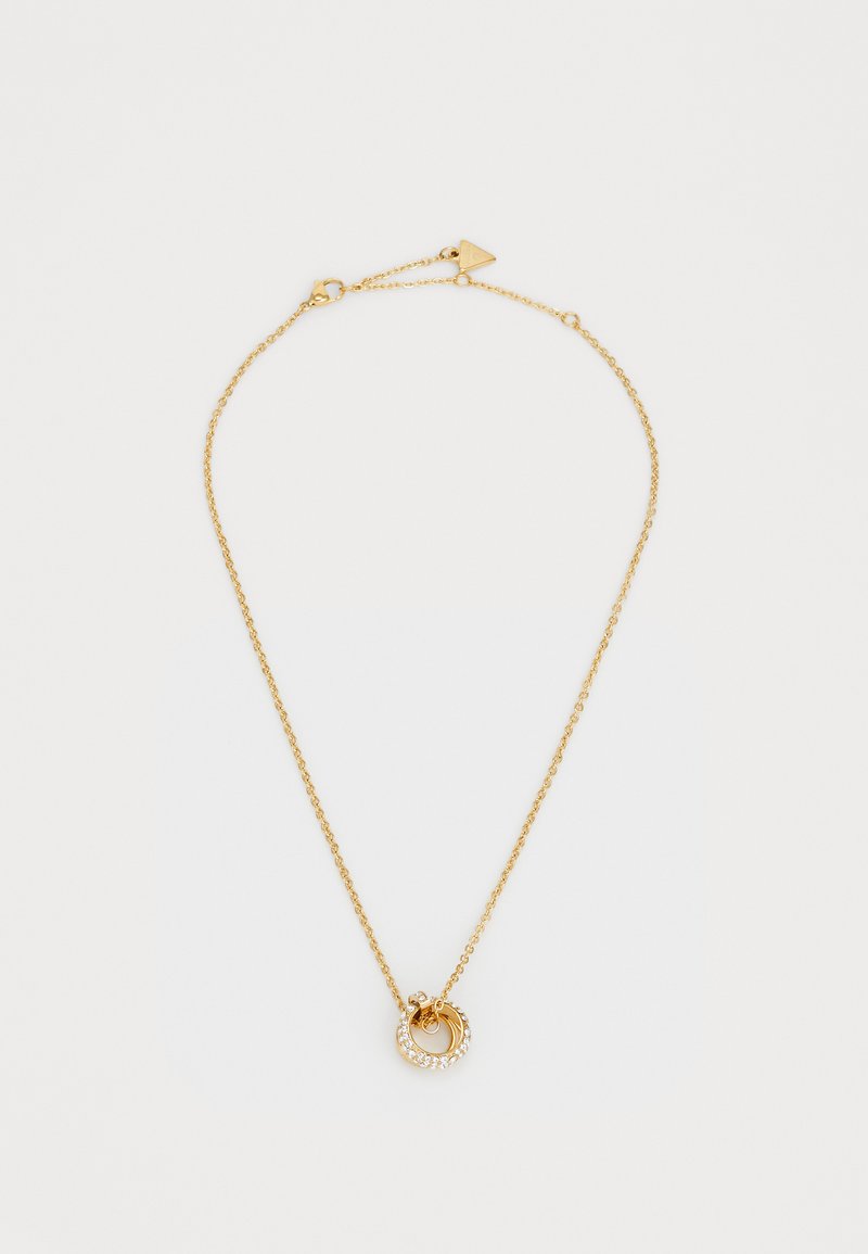 Gold chain necklace with a circular pendant, featuring small clear crystals along the edge. Delicate design, textured chain links.
