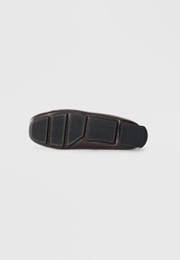 Dark brown shoe sole with three textured rubber sections and a flat heel. Smooth leather finish with reinforced edges.