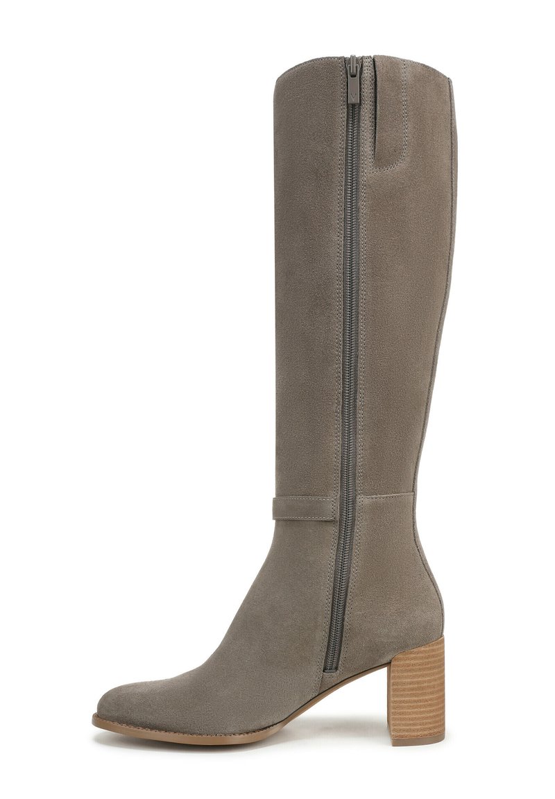 Gray suede knee-high boot with a side zipper, elongated pointed toe, and a stacked wooden heel with horizontal grooves.