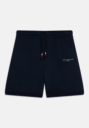 Marineblaue Baumwollshorts mit elastischem Bund, Zugbanddetails und einem weißen Logo, das auf der unteren linken Seite aufgedruckt ist.