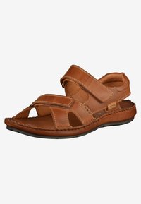Brown leather sandal with open toe and heel, featuring two adjustable Velcro straps, textured footbed, and stitched detailing along the sole.