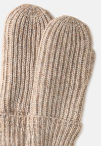 Gebreide wanten in lichte beige tinten, met een geribbelde textuur en ronde toppen. Versterkte manchet voor extra warmte en comfort.