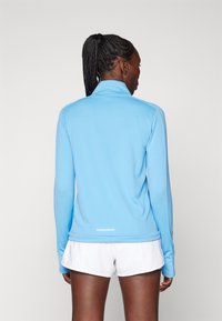 Nike Performance DRI-FIT PACER - Top dugih rukava - university blue/reflective silver