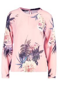 Maglietta a maniche lunghe rosa con stampa floreale in viola, bianco e verde. Tessuto morbido con scollo rotondo e dettaglio a chiave sul retro.