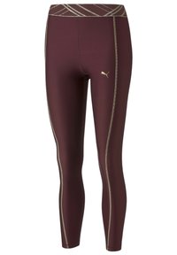 Leggings di un profondo bordeaux con un design aderente. Presentano dettagli dorati sulla vita e sulle cuciture laterali, realizzati in un materiale elasticizzato.