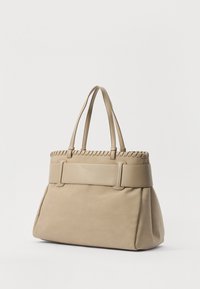 Beige leather tote bag with braided top edge, two handles, and a structured base. Features a wide, flat strap and smooth texture.