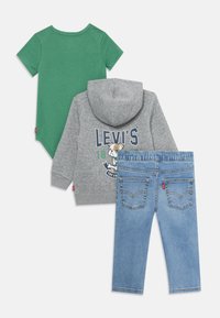 Green short-sleeve baby bodysuit, gray hooded sweatshirt with dog graphic and "Levi's" text, and light blue elastic-waist denim jeans.