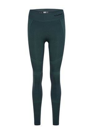 Donkergroene naadloze sportleggings met getextureerde panelen, een hoge tailleband en een klein zwart Hummel-logo aan de rechterkant van de taille.
