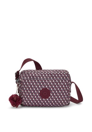 Borsa a tracolla a motivi rossi e grigi realizzata in tessuto resistente. Caratterizzata da una chiusura con zip, una tracolla regolabile e un charm con pompon.
