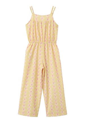 Tuta gialla senza maniche con spalline sottili, vita elasticizzata, gambe larghe e motivo floreale geometrico rosa.