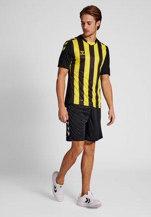 Hummel CORE XK  - T-shirts print - black blazing yellow