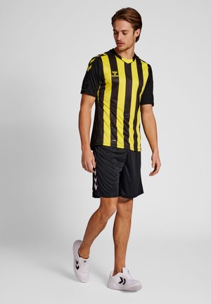 Hummel CORE XK  - T-shirt con stampa - black blazing yellow