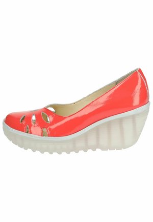 Coral patent leather wedge shoe with cut-out details on the toe and a translucent, ridged sole. Features a smooth, glossy finish.
