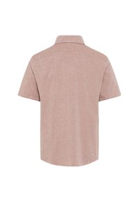 Camicia a maniche corte di colore rosa chiaro, con colletto e una superficie liscia. Il retro è semplice con orlo arrotondato.