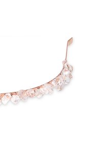 Serre-tête en or rose orné d'accents de cristal transparents et irréguliers sur le devant, présentant une surface lisse et brillante ainsi qu'un design délicat.